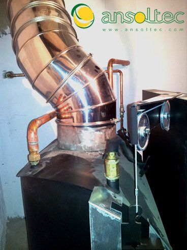 Salida de humos y conexiones hidráulicas