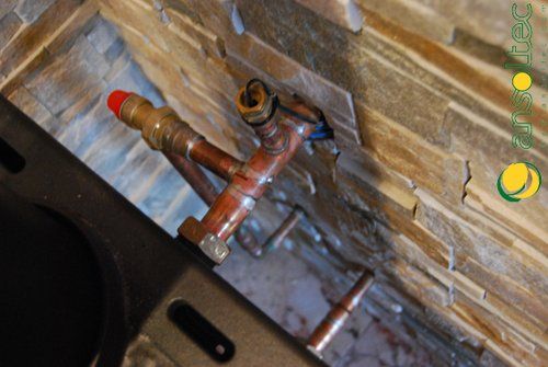 Válvula de descarga térmica y control de temperatura