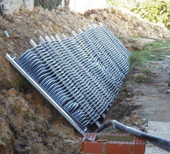 Introducción de barrera en zanja