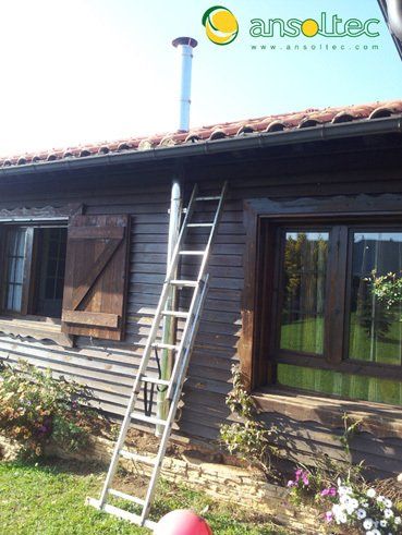 Salida de humos apta para combustibles sólidos