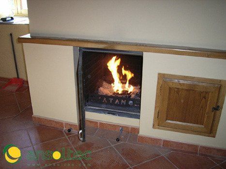 Chimenea con recubrimiento alimentando al suelo radiante