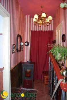 Vista del pasillo y estufa