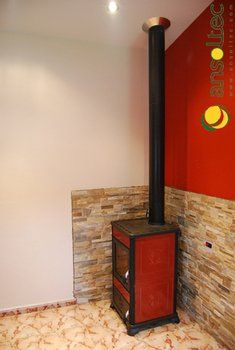 Termoestufa de leña y salida de humos